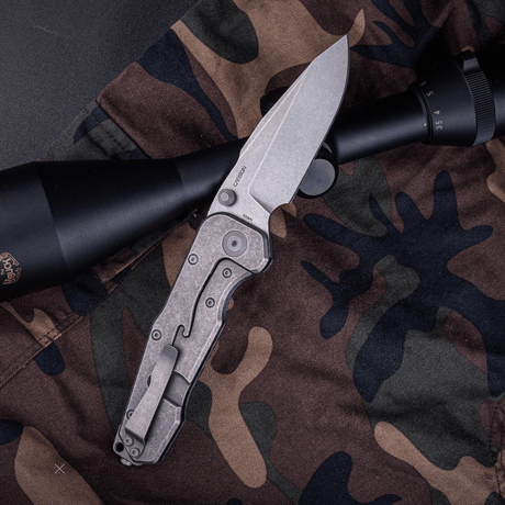 Evolution | S35VN | Titanium & Carbon Fiber