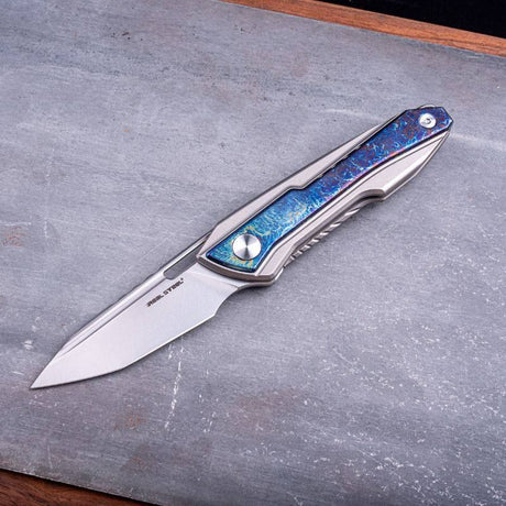 Real Steel Bullet EDC Pocket Knife - Front Flipper with Frame lock (2.91" S35VN Modified Tanto Blade) Titanium Handles with Blue Flash Titanium Inlays 5221BF 245.00 Real Steel Knives www.realsteelknives.com