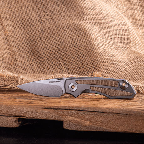 Real Steel Delta 2600 Frame Lock Folding Knife - 2.90" S35VN Stonewashed Drop Point Blade, Titanium with Natural Canvas Micarta Inlays 7101N 136.50 Real Steel Knives www.realsteelknives.com