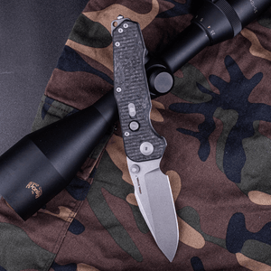 Real Steel Evolution Frame Lock & Button Unlocking Heavy Duty Tactical Knife, 3.78" S35VN Drop Point Blade, Shred Carbon Fiber / Titanium Handle 9913 255.00 Real Steel Knives www.realsteelknives.com