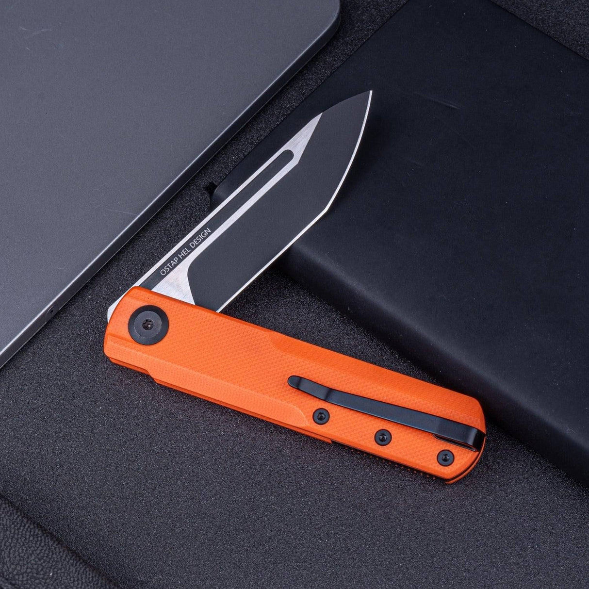 Real Steel G-Tanto EDC Double Detent Ball Lock Folding Knife-2.64" Nitro-V Black Two-Tone Finish Tanto Blade and Orange G10 7801OB 58.50 Real Steel Knives www.realsteelknives.com