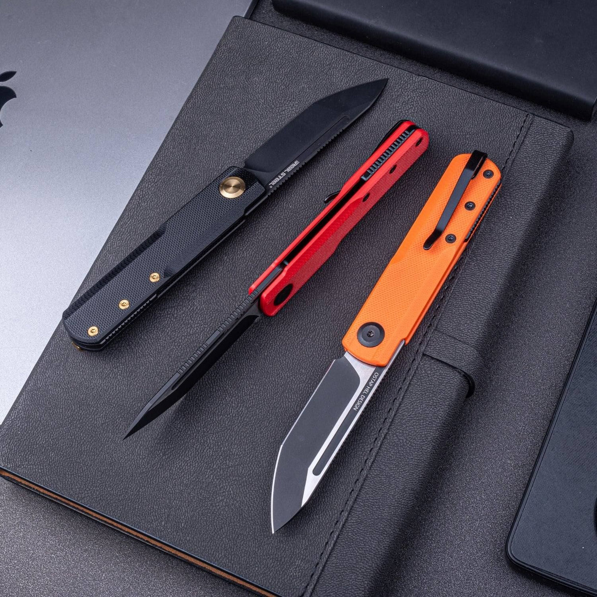 Real Steel G-Tanto EDC Double Detent Ball Lock Folding Knife-2.64" Nitro-V Black Two-Tone Finish Tanto Blade and Orange G10 7801OB 58.50 Real Steel Knives www.realsteelknives.com