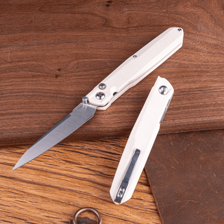 Real Steel G5 Metamorph Button Lock Folding Knife - 3.62" Alleima 14C28N Plain Blade & Ivory G10 Handle 7831I 63.00 Real Steel Knives www.realsteelknives.com