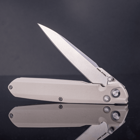 Real Steel G5 Metamorph Button Lock Folding Knife - 3.62" Alleima 14C28N Plain Blade & Ivory G10 Handle 7831I 63.00 Real Steel Knives www.realsteelknives.com