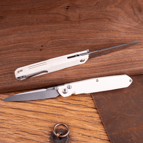 Real Steel G5 Metamorph Button Lock Folding Knife - 3.62" Alleima 14C28N Plain Blade & Ivory G10 Handle 7831I 63.00 Real Steel Knives www.realsteelknives.com