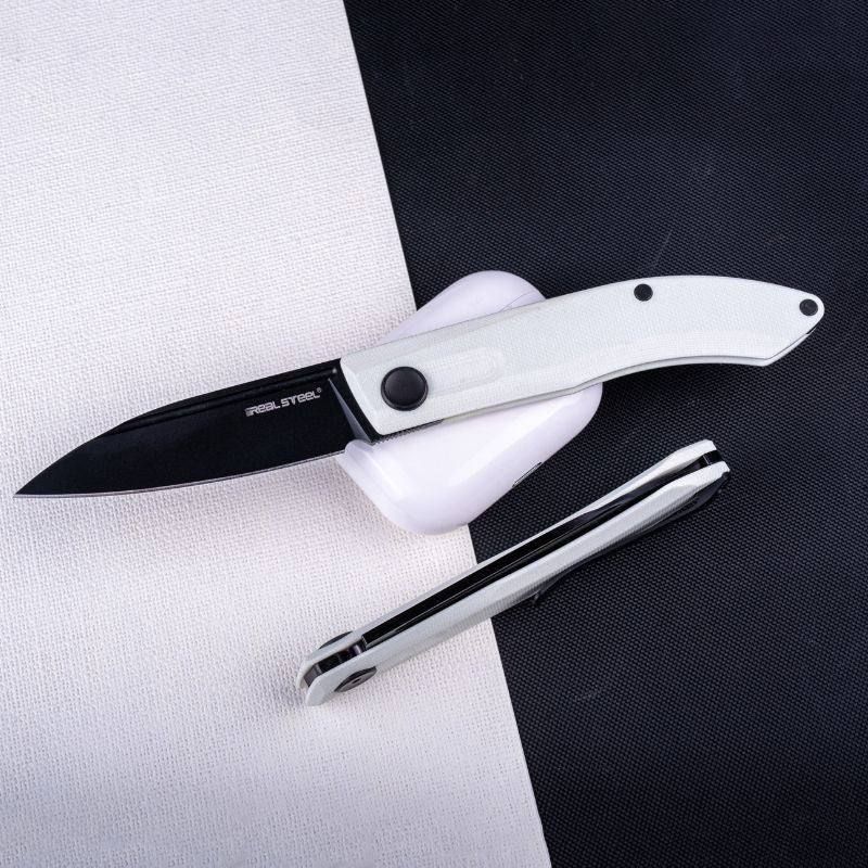 Real Steel Knives Stella Slipjoint Folding Knife 2.95" VG10 Black Spear Point, White G10 Handle 7051BW 69.00 Real Steel Knives www.realsteelknives.com