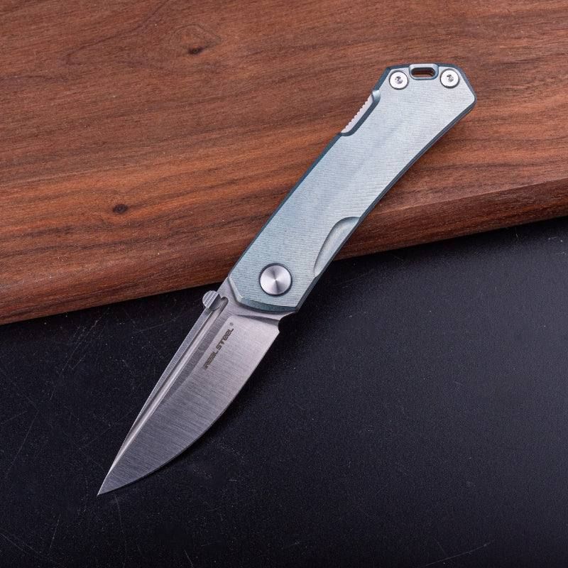 Real Steel LUNA Maius Backlock Folding Knife -3.03" Satin Bohler N690 Blade, Titanium Handle 7098 99.00 Real Steel Knives www.realsteelknives.com