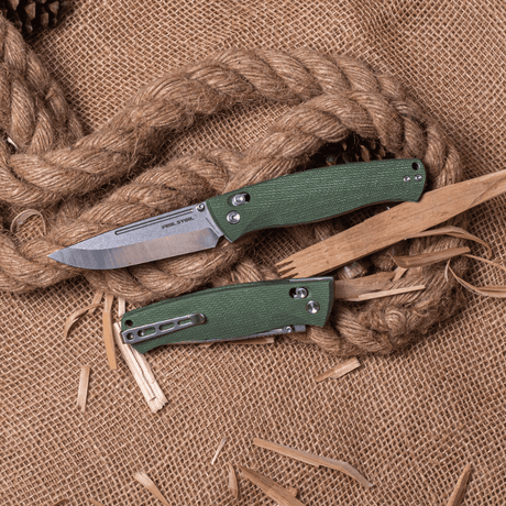 Real Steel Pathfinder Bushcraft Folder Crossbar Lock Folding Knife -3.54" Two-Tone Alleima 14C28N Drop Point Blade and Green Micarta Handle 7851G 79.00 Real Steel Knives www.realsteelknives.com