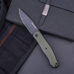 Real Steel Serenity Front Flipper / Liner Lock Folding Knife 3.43" N690 Black Stonewashed Drop Point Blade, OD Green G10 Handle 7682G 77.00 Real Steel Knives www.realsteelknives.com