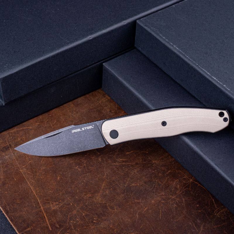 Real Steel Serenity Slipjoint Folding Knife (3.43" N690 Black Stonewashed Drop Point Blade) Ivory G10 Handle 7681I 77.00 Real Steel Knives www.realsteelknives.com